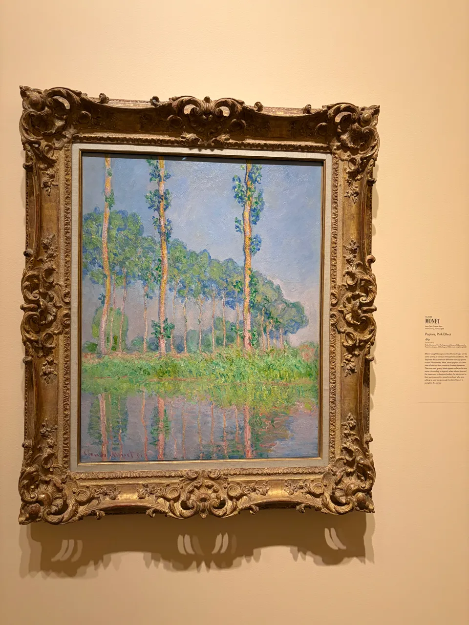 A landscape painting of tall poplar trees.