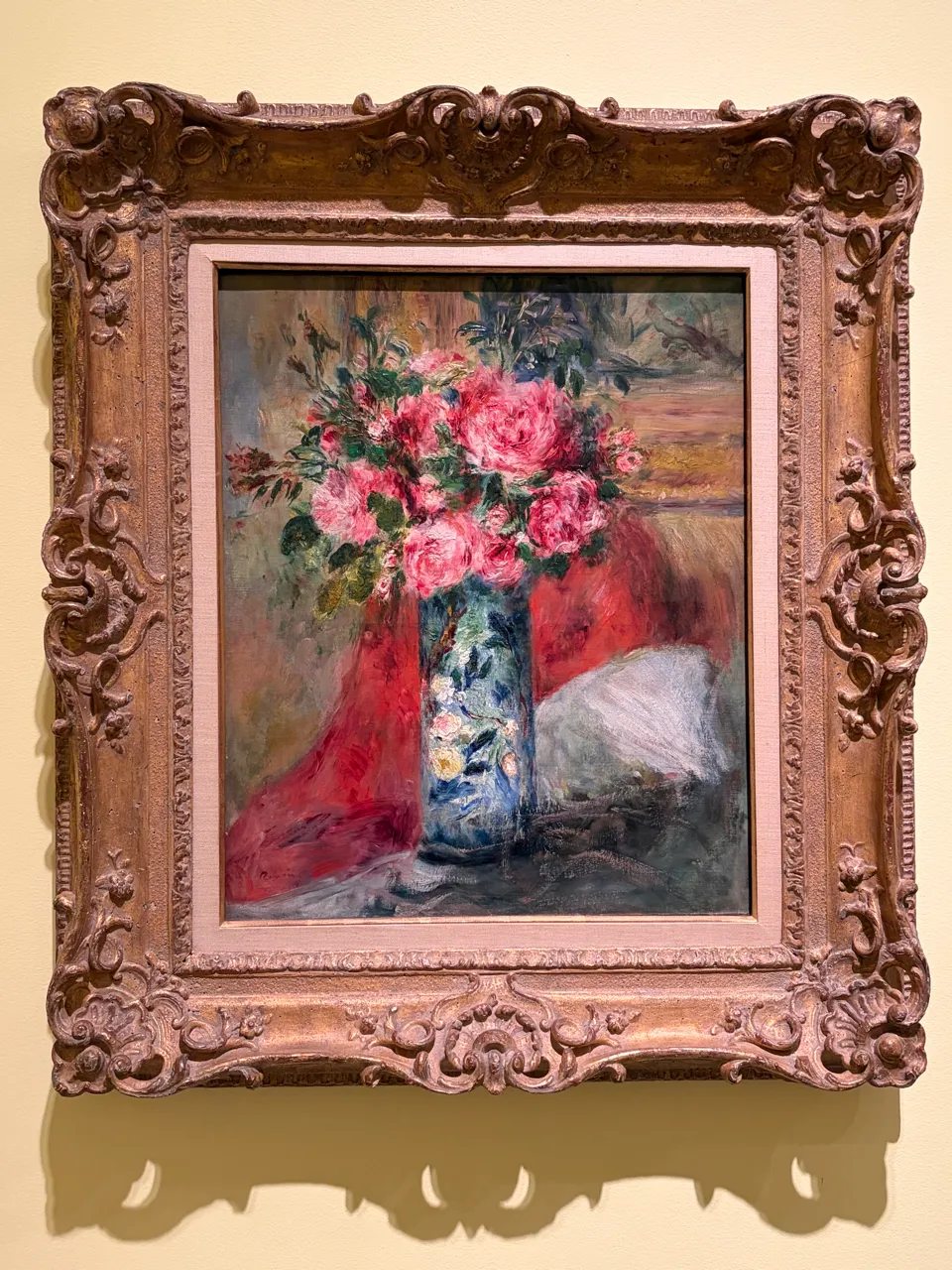 A floral painting with pink and white peonies in a vase.